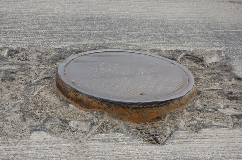 384176d1309457641-hit-raised-manhole-cover-road-construction-dsc_0026.jpg